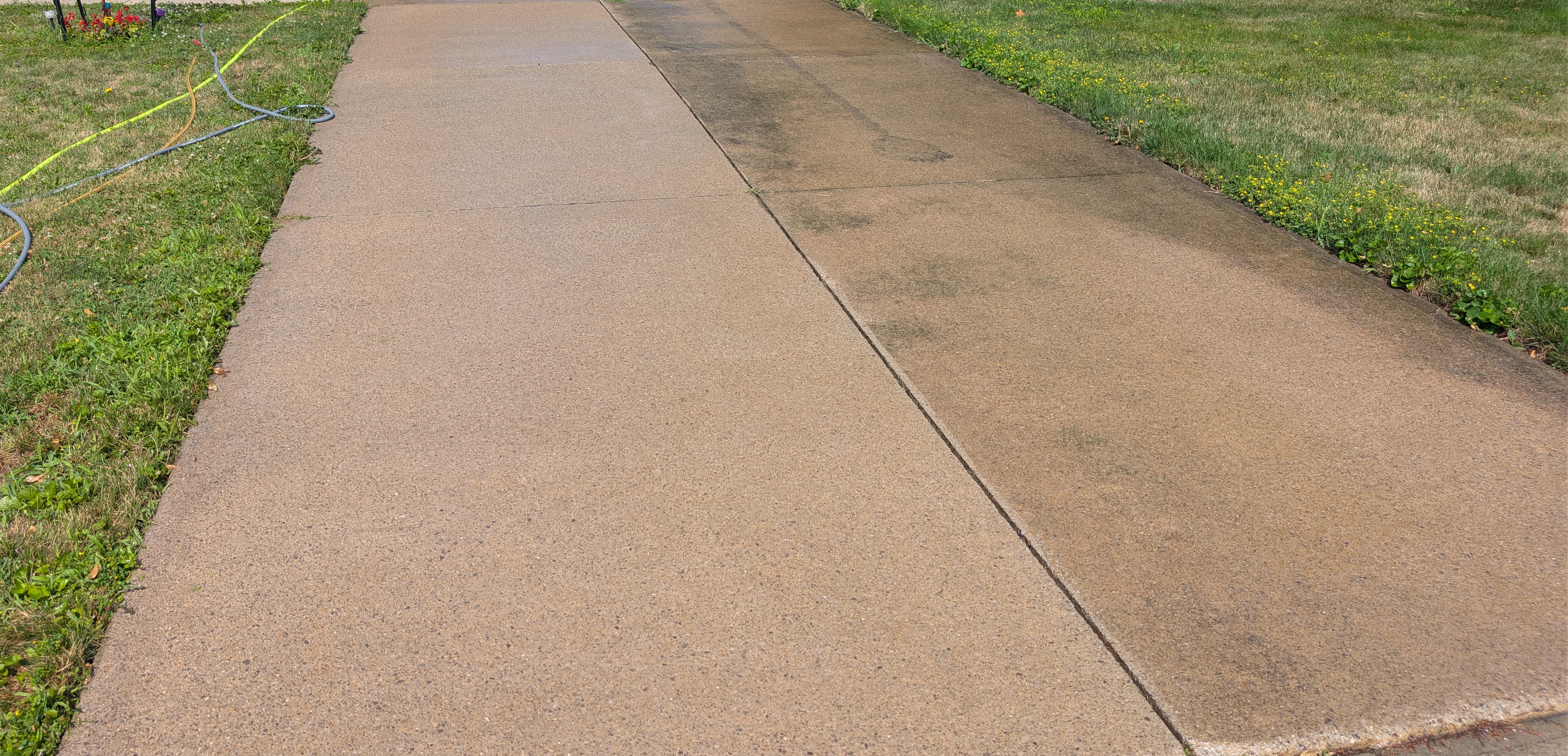 Driveway after pressure washing